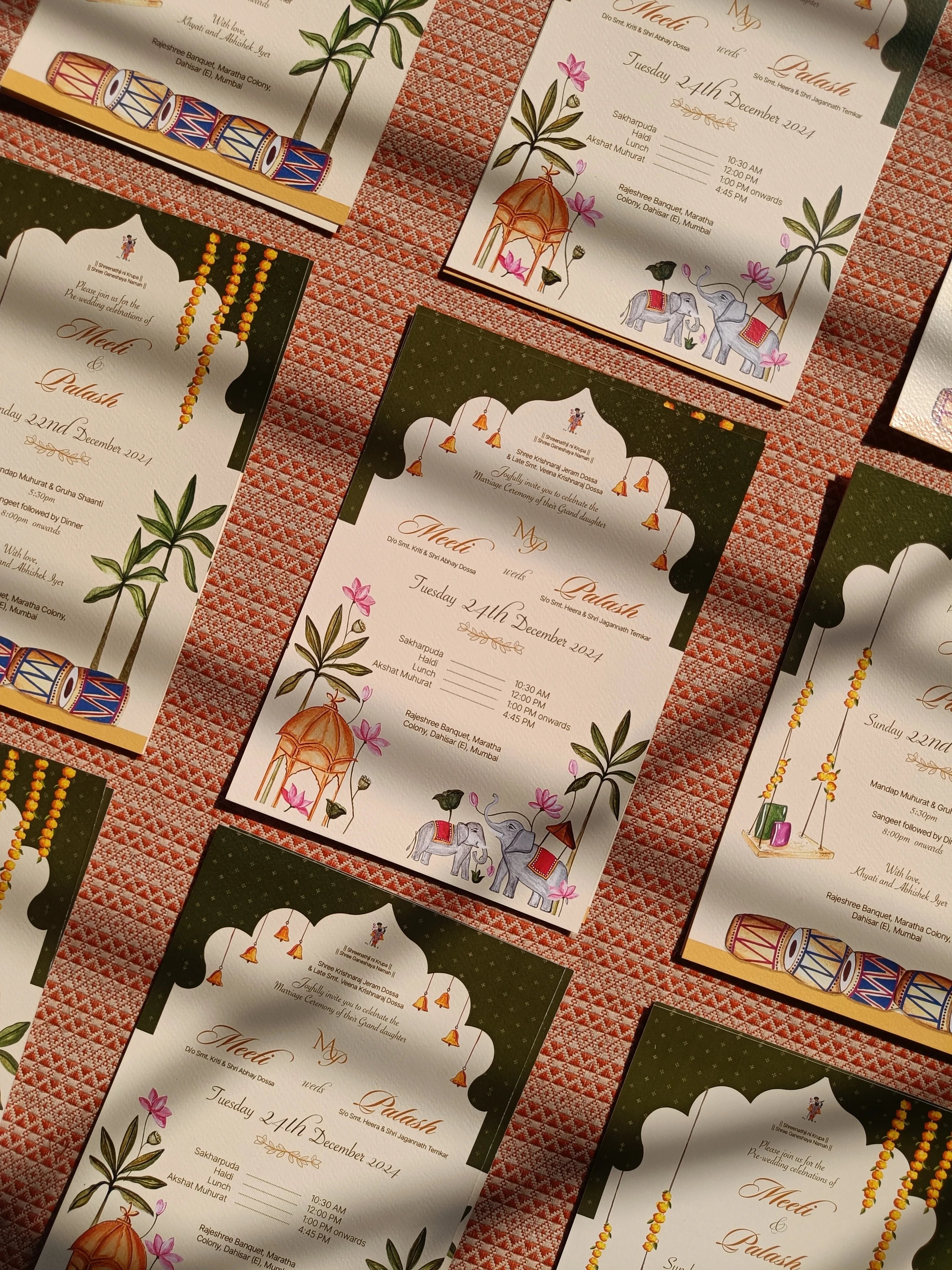 Hand-illustrated Wedding invitation with Indian motifs and elements.